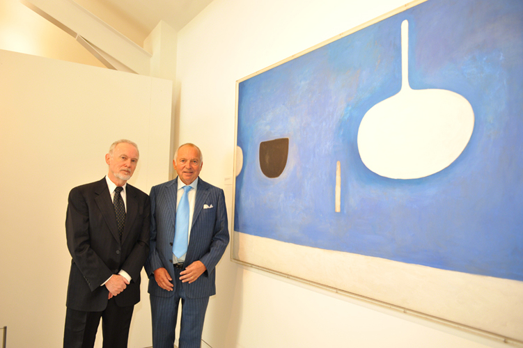 James Scott (left) and Robert Scott (right) in front of Blue Still Life with Knife, 1971